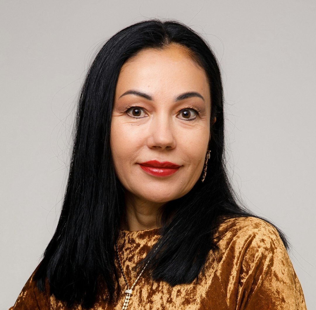 Portrait of a Turkish woman media instructor smiling